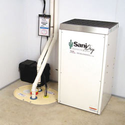 Sump pump system, dehumidifier, and basement wall panels installed during a sump pump installation in Milaca