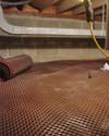 Crawl space drainage matting installed in a home in Eveleth