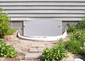 Rigid plastic crawl space access well installed in a Bemidji crawl space