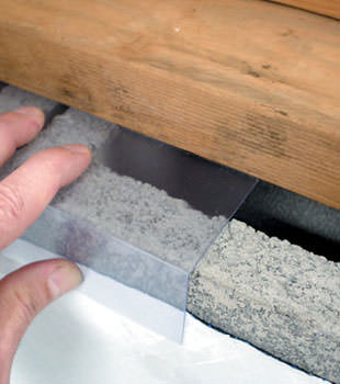Block wall clear covering for wet crawl spaces in Mora
