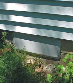 A gray crawl space vent cover in Ladysmith