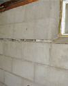 Severely buckling foundation walls in a home in Spooner in need of repairs.