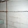 Severe foundation damage from a long crack in a bucking wall of a Milaca home.