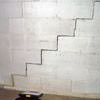 A diagonal stair step crack along the foundation wall of a Eveleth home