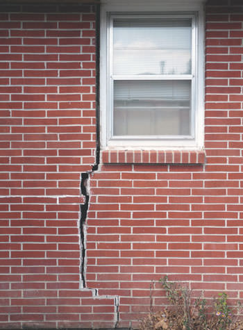 severe foundation wall cracks along a window in Pierz