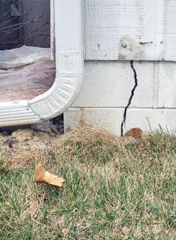 foundation wall cracks due to street creep in Pequot Lakes