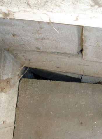 inward rotation of a foundation wall damaged by street creep in a garage in Pierz