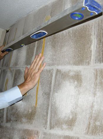severe foundation wall failure symptoms of a basement wall in Cass Lake