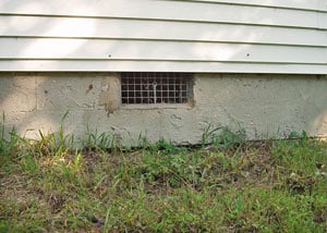 Open crawl space vents that let rodents, termites, and other pests in a home in Aitkin