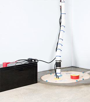 A sump pump installed in Crosby by Northern States Basement Systems