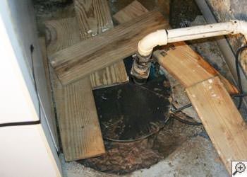 An ugly, clogged sump pump system in Cloquet, Minnesota and Wisconsin