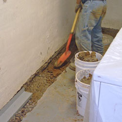 Digging a trench for a French Drain system in Duluth
