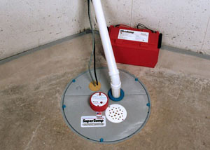 A sump pump system with a battery backup system installed in Baxter