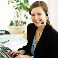 A disaster restoration customer service expert in Grand Rapids manning the phones