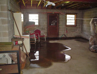 a flooded basement floor in a Nisswa home