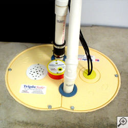 A sump pump system installed along a basement floor in Duluth.