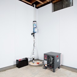 Sump pump system, dehumidifier, and basement wall panels installed during a sump pump installation in Milaca