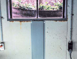Repaired waterproofed basement window leak in Grand Rapids